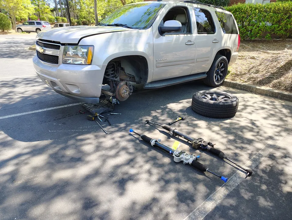 SUV raised safely for steering rack and suspension work